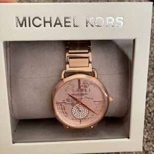 Rose gold Michael Kors globe watch